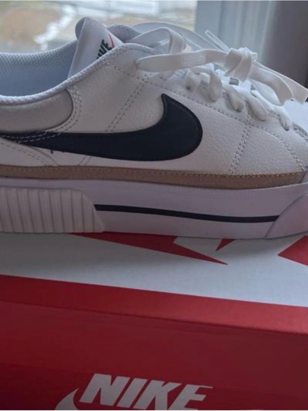 Nike White Low-Top Sneaker Interior with Black Logo Tag